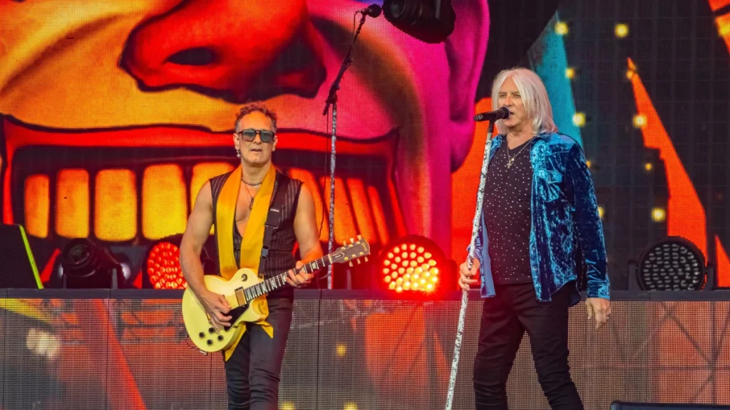 Def Leppard's Vivian Campbell and Joe Elliott on stage at Sweden Rock Festival